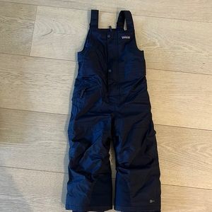 Baby snow pile bib size 4
